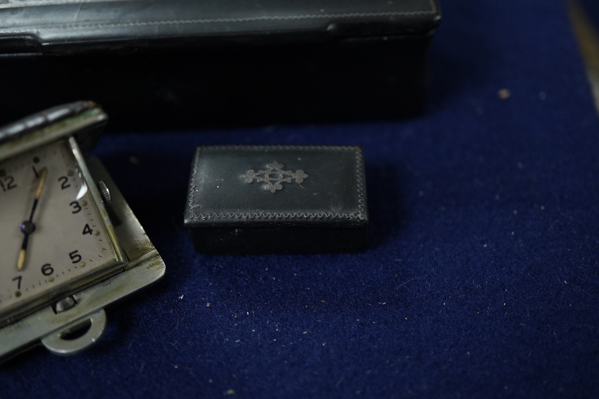 Three Georgian Snuff boxes and a timepiece.